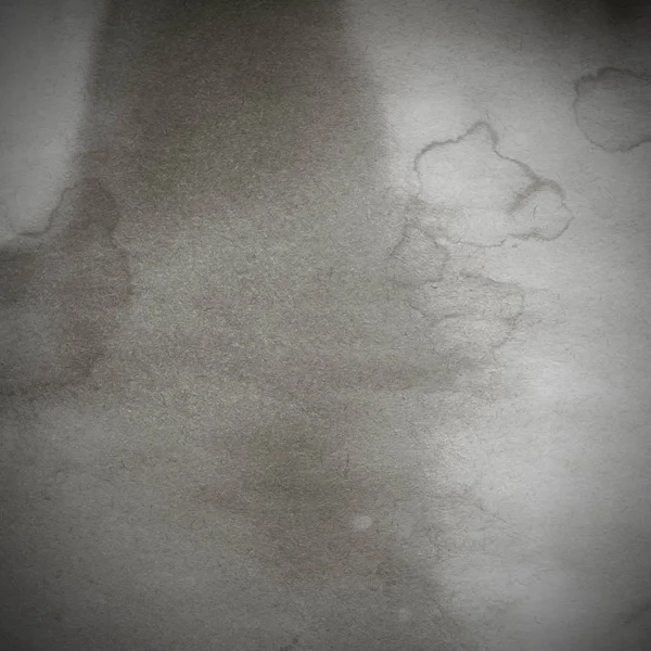 Eski toprak ve kirli lekelerle dolu bir arka plan. Boş eski kağıt çarşaf. Eski ve antika sanat konsepti. Karton, taş, beton ya da doğal mermer gibi desen. 