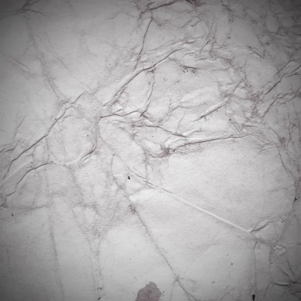 Eski toprak ve kirli lekelerle dolu bir arka plan. Boş eski kağıt çarşaf. Eski ve antika sanat konsepti. Karton, taş, beton ya da doğal mermer gibi desen.