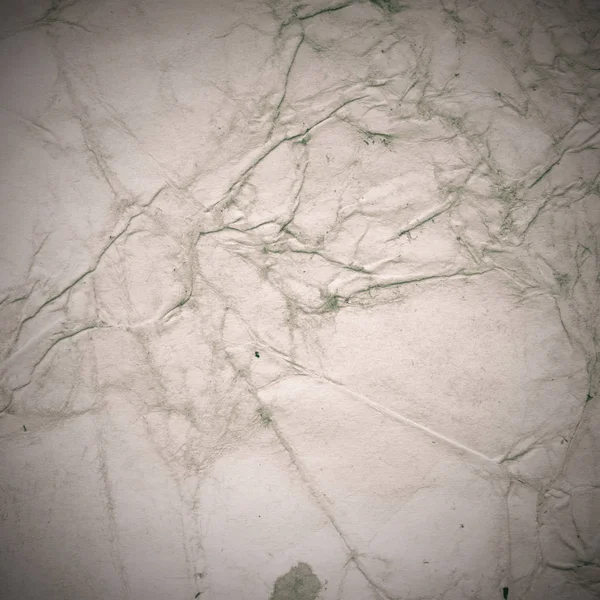 Eski toprak ve kirli lekelerle dolu bir arka plan. Boş eski kağıt çarşaf. Eski ve antika sanat konsepti. Karton, taş, beton ya da doğal mermer gibi desen 