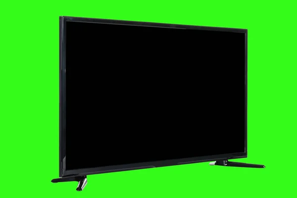 現代の高精細テレビ 抽象的なぼやけた緑のクロマキーの背景に隔離された 空白の黒い画面を持つ液晶フラットモニター 技術と4Kテレビの広告コンセプト 詳細なスタジオクローズアップ — ストック写真