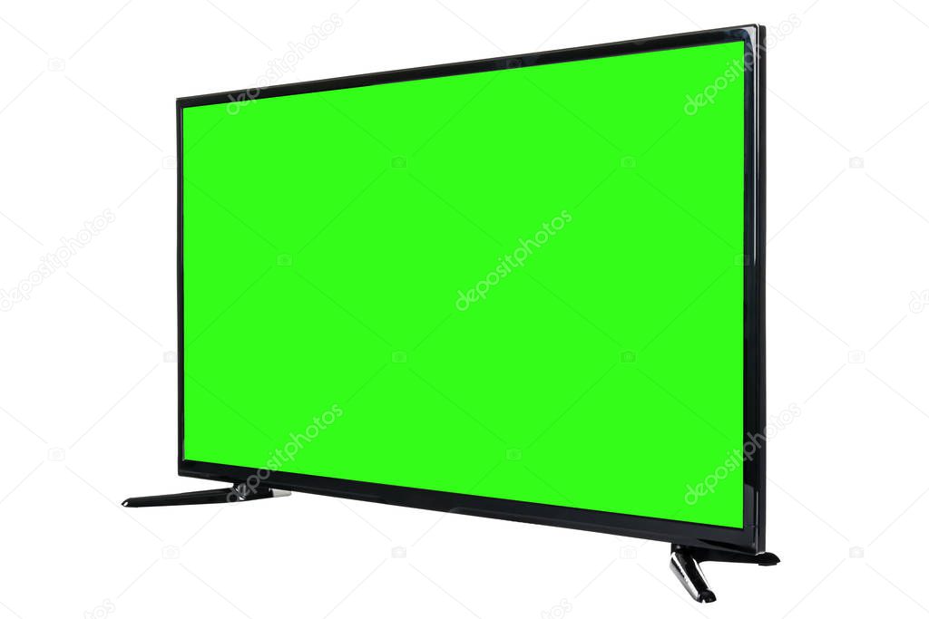 Modern high definition TV. LCD flat monitor with blank green chromakey screen, isolated on abstract blurred white background. Technology and 4k television advertising concept. Detailed studio closeup