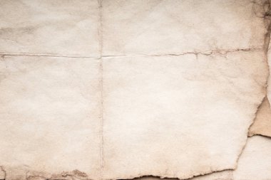 Eski kağıt çarşaf. Toz ve kirli lekelerle dolu boş bir arka plan. Eski ve antika sanat konsepti. Ayrıntılı yakın çekim stüdyo çekimi. Ön manzara. Ayarlanmış