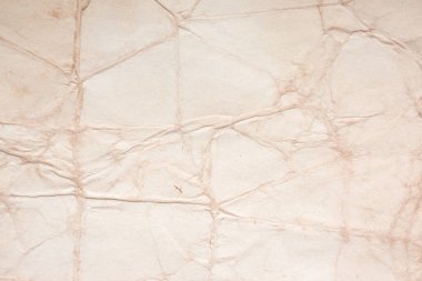 Eski kağıt çarşaf. Toz ve kirli lekelerle dolu boş bir arka plan. Eski ve antika sanat konsepti. Ayrıntılı yakın çekim stüdyo çekimi. Ön manzara. Ayarlanmış