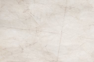 Eski kağıt çarşaf. Toz ve kirli lekelerle dolu boş bir arka plan. Eski ve antika sanat konsepti. Ayrıntılı yakın çekim stüdyo çekimi. Ön manzara. Ayarlanmış