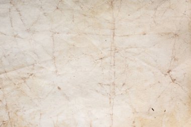 Eski kağıt çarşaf. Toz ve kirli lekelerle dolu boş bir arka plan. Eski ve antika sanat konsepti. Ayrıntılı yakın çekim stüdyo çekimi. Ön manzara. Ayarlanmış