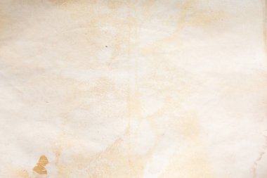 Eski kağıt çarşaf. Toz ve kirli lekelerle dolu boş bir arka plan. Eski ve antika sanat konsepti. Ayrıntılı yakın çekim stüdyo çekimi. Ön manzara. Ayarlanmış