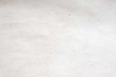 Eski kağıt çarşaf. Toz ve kirli lekelerle dolu boş bir arka plan. Eski ve antika sanat konsepti. Ayrıntılı yakın çekim stüdyo çekimi. Ön manzara. Ayarlanmış