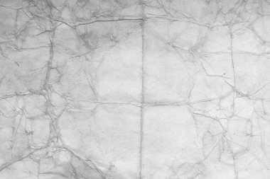 Eski kağıt çarşaf. Toz ve kirli lekelerle dolu boş bir arka plan. Eski ve antika sanat konsepti. Ayrıntılı yakın çekim stüdyo çekimi. Ön manzara. Ayarlanmış