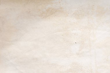 Eski kağıt çarşaf. Toz ve kirli lekelerle dolu boş bir arka plan. Eski ve antika sanat konsepti. Ayrıntılı yakın çekim stüdyo çekimi. Ön manzara. Ayarlanmış