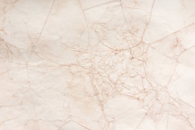 Eski kağıt çarşaf. Toz ve kirli lekelerle dolu boş bir arka plan. Eski ve antika sanat konsepti. Ayrıntılı yakın çekim stüdyo çekimi. Ön manzara. Ayarlanmış