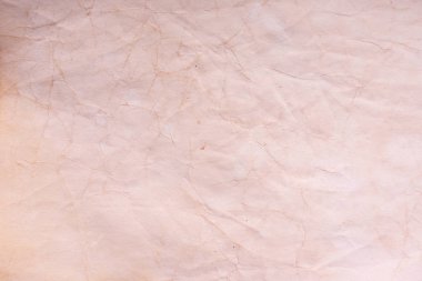 Eski kağıt çarşaf. Toz ve kirli lekelerle dolu boş bir arka plan. Eski ve antika sanat konsepti. Ayrıntılı yakın çekim stüdyo çekimi. Ön manzara. Ayarlanmış