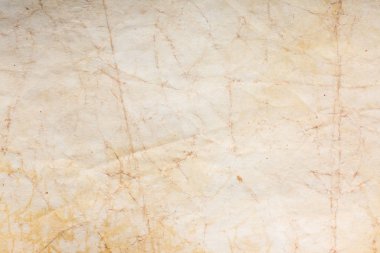 Eski kağıt çarşaf. Toz ve kirli lekelerle dolu boş bir arka plan. Eski ve antika sanat konsepti. Ayrıntılı yakın çekim stüdyo çekimi. Ön manzara. Ayarlanmış