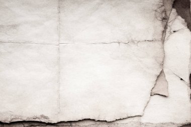Eski kağıt çarşaf. Toz ve kirli lekelerle dolu boş bir arka plan. Eski ve antika sanat konsepti. Ayrıntılı yakın çekim stüdyo çekimi. Ön manzara. Ayarlanmış