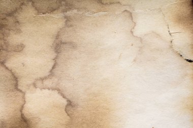 Eski kağıt çarşaf. Toz ve kirli lekelerle dolu boş bir arka plan. Eski ve antika sanat konsepti. Ayrıntılı yakın çekim stüdyo çekimi. Ön manzara. Ayarlanmış