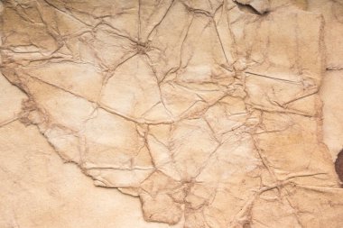 Eski kağıt çarşaf. Toz ve kirli lekelerle dolu boş bir arka plan. Eski ve antika sanat konsepti. Ayrıntılı yakın çekim stüdyo çekimi. Ön manzara. Ayarlanmış