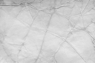 Eski kağıt çarşaf. Toz ve kirli lekelerle dolu boş bir arka plan. Eski ve antika sanat konsepti. Ayrıntılı yakın çekim stüdyo çekimi. Ön manzara. Ayarlanmış