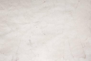 Eski kağıt çarşaf. Toz ve kirli lekelerle dolu boş bir arka plan. Eski ve antika sanat konsepti. Ayrıntılı yakın çekim stüdyo çekimi. Ön manzara. Ayarlanmış