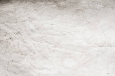 Eski kağıt çarşaf. Toz ve kirli lekelerle dolu boş bir arka plan. Eski ve antika sanat konsepti. Ayrıntılı yakın çekim stüdyo çekimi. Ön manzara. Ayarlanmış