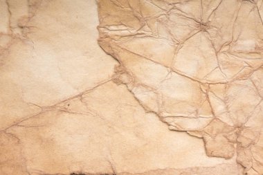 Eski kağıt çarşaf. Toz ve kirli lekelerle dolu boş bir arka plan. Eski ve antika sanat konsepti. Ayrıntılı yakın çekim stüdyo çekimi. Ön manzara. Ayarlanmış