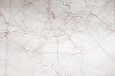 Eski kağıt çarşaf. Toz ve kirli lekelerle dolu boş bir arka plan. Eski ve antika sanat konsepti. Ayrıntılı yakın çekim stüdyo çekimi. Ön manzara. Ayarlanmış