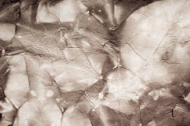 Eski kağıt çarşaf. Toz ve kirli lekelerle dolu boş bir arka plan. Eski ve antika sanat konsepti. Ayrıntılı yakın çekim stüdyo çekimi. Ön manzara. Ayarlanmış