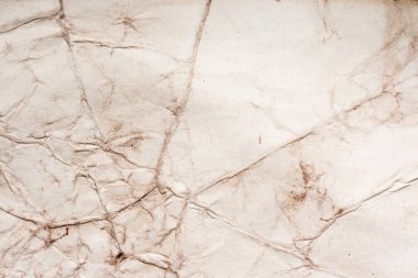 Eski kağıt çarşaf. Toz ve kirli lekelerle dolu boş bir arka plan. Eski ve antika sanat konsepti. Ayrıntılı yakın çekim stüdyo çekimi. Ön manzara. Ayarlanmış