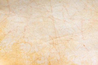 Eski kağıt çarşaf. Toz ve kirli lekelerle dolu boş bir arka plan. Eski ve antika sanat konsepti. Ayrıntılı yakın çekim stüdyo çekimi. Ön manzara. Ayarlanmış