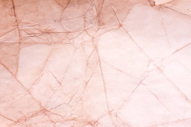 Eski kağıt çarşaf. Toz ve kirli lekelerle dolu boş bir arka plan. Eski ve antika sanat konsepti. Ayrıntılı yakın çekim stüdyo çekimi. Ön manzara. Ayarlanmış