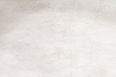 Eski kağıt çarşaf. Toz ve kirli lekelerle dolu boş bir arka plan. Eski ve antika sanat konsepti. Ayrıntılı yakın çekim stüdyo çekimi. Ön manzara. Ayarlanmış