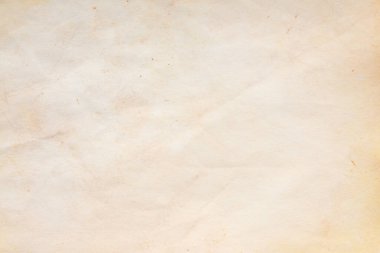 Eski kağıt çarşaf. Toz ve kirli lekelerle dolu boş bir arka plan. Eski ve antika sanat konsepti. Ayrıntılı yakın çekim stüdyo çekimi. Ön manzara. Ayarlanmış