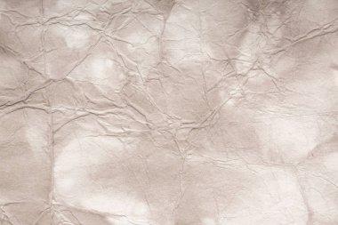 Eski kağıt çarşaf. Toz ve kirli lekelerle dolu boş bir arka plan. Eski ve antika sanat konsepti. Ayrıntılı yakın çekim stüdyo çekimi. Ön manzara. Ayarlanmış