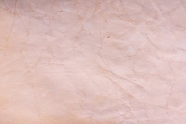 Eski kağıt çarşaf. Toz ve kirli lekelerle dolu boş bir arka plan. Eski ve antika sanat konsepti. Ayrıntılı yakın çekim stüdyo çekimi. Ön manzara. Ayarlanmış