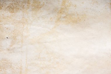 Eski kağıt çarşaf. Toz ve kirli lekelerle dolu boş bir arka plan. Eski ve antika sanat konsepti. Ayrıntılı yakın çekim stüdyo çekimi. Ön manzara. Ayarlanmış