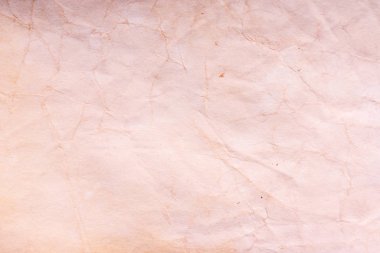 Eski kağıt çarşaf. Toz ve kirli lekelerle dolu boş bir arka plan. Eski ve antika sanat konsepti. Ayrıntılı yakın çekim stüdyo çekimi. Ön manzara. Ayarlanmış