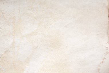 Eski kağıt çarşaf. Toz ve kirli lekelerle dolu boş bir arka plan. Eski ve antika sanat konsepti. Ayrıntılı yakın çekim stüdyo çekimi. Ön manzara. Ayarlanmış