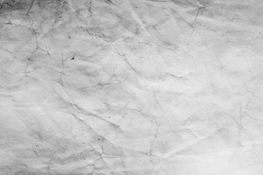 Eski kağıt çarşaf. Toz ve kirli lekelerle dolu boş bir arka plan. Eski ve antika sanat konsepti. Ayrıntılı yakın çekim stüdyo çekimi. Ön manzara. Ayarlanmış