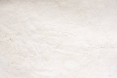 Eski kağıt çarşaf. Toz ve kirli lekelerle dolu boş bir arka plan. Eski ve antika sanat konsepti. Ayrıntılı yakın çekim stüdyo çekimi. Ön manzara. Ayarlanmış