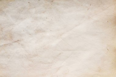 Eski kağıt çarşaf. Toz ve kirli lekelerle dolu boş bir arka plan. Eski ve antika sanat konsepti. Ayrıntılı yakın çekim stüdyo çekimi. Ön manzara. Ayarlanmış