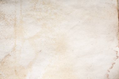 Eski kağıt çarşaf. Toz ve kirli lekelerle dolu boş bir arka plan. Eski ve antika sanat konsepti. Ayrıntılı yakın çekim stüdyo çekimi. Ön manzara. Ayarlanmış