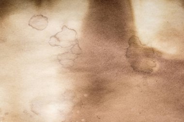 Eski kağıt çarşaf. Toz ve kirli lekelerle dolu boş bir arka plan. Eski ve antika sanat konsepti. Ayrıntılı yakın çekim stüdyo çekimi. Ön manzara. Ayarlanmış