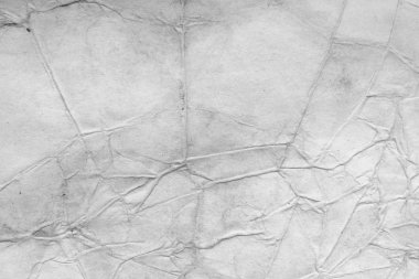 Eski kağıt çarşaf. Toz ve kirli lekelerle dolu boş bir arka plan. Eski ve antika sanat konsepti. Ayrıntılı yakın çekim stüdyo çekimi. Ön manzara. Ayarlanmış