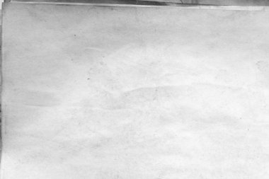 Eski kağıt çarşaf. Toz ve kirli lekelerle dolu boş bir arka plan. Eski ve antika sanat konsepti. Ayrıntılı yakın çekim stüdyo çekimi. Ön manzara. Ayarlanmış