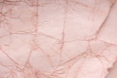 Eski kağıt çarşaf. Toz ve kirli lekelerle dolu boş bir arka plan. Eski ve antika sanat konsepti. Ayrıntılı yakın çekim stüdyo çekimi. Ön manzara. Ayarlanmış