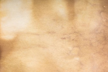 Eski kağıt çarşaf. Toz ve kirli lekelerle dolu boş bir arka plan. Eski ve antika sanat konsepti. Ayrıntılı yakın çekim stüdyo çekimi. Ön manzara. Ayarlanmış