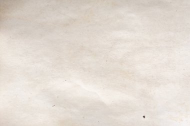 Eski kağıt çarşaf. Toz ve kirli lekelerle dolu boş bir arka plan. Eski ve antika sanat konsepti. Ayrıntılı yakın çekim stüdyo çekimi. Ön manzara. Ayarlanmış