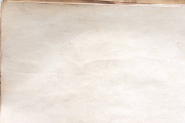 Eski kağıt çarşaf. Toz ve kirli lekelerle dolu boş bir arka plan. Eski ve antika sanat konsepti. Ayrıntılı yakın çekim stüdyo çekimi. Ön manzara. Ayarlanmış