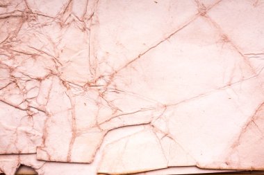 Eski kağıt çarşaf. Toz ve kirli lekelerle dolu boş bir arka plan. Eski ve antika sanat konsepti. Ayrıntılı yakın çekim stüdyo çekimi. Ön manzara. Ayarlanmış