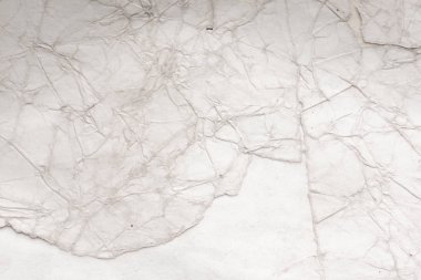 Eski kağıt çarşaf. Toz ve kirli lekelerle dolu boş bir arka plan. Eski ve antika sanat konsepti. Ayrıntılı yakın çekim stüdyo çekimi. Ön manzara. Ayarlanmış