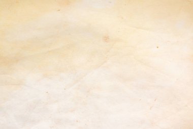 Eski kağıt çarşaf. Toz ve kirli lekelerle dolu boş bir arka plan. Eski ve antika sanat konsepti. Ayrıntılı yakın çekim stüdyo çekimi. Ön manzara. Ayarlanmış