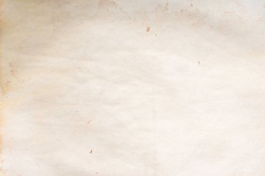 Eski kağıt çarşaf. Toz ve kirli lekelerle dolu boş bir arka plan. Eski ve antika sanat konsepti. Ayrıntılı yakın çekim stüdyo çekimi. Ön manzara. Ayarlanmış